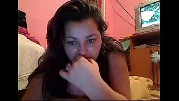 Gatinha peituda na webcam